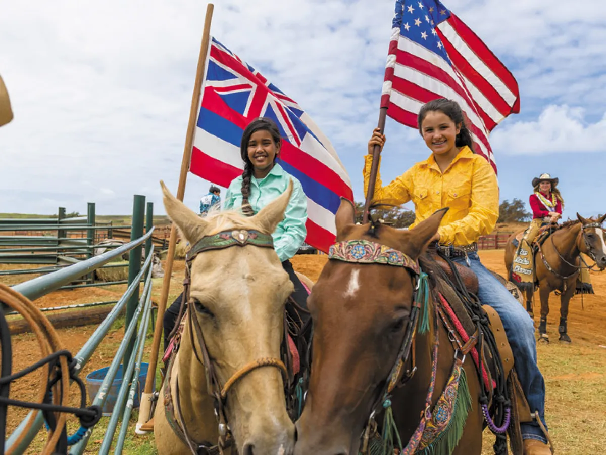 a group of people riding on the back of a horse